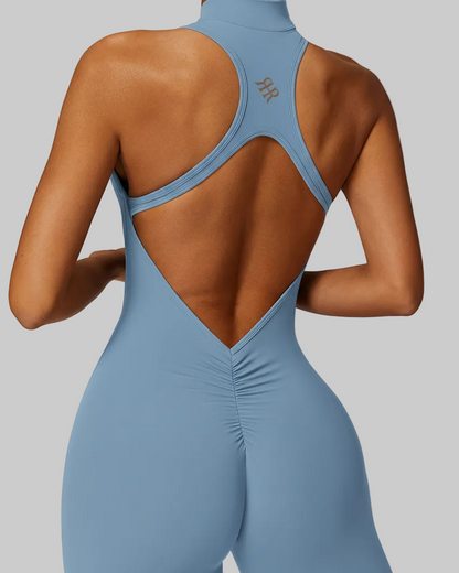 Woman wearing a light blue jumpsuit, gym and workout activewear in canada