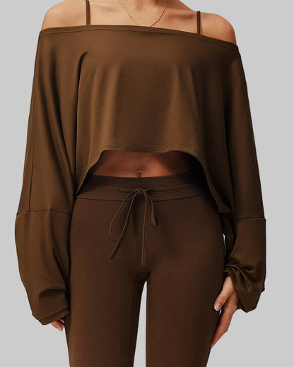 Brown off-shoulder top and pants set on a neutral background